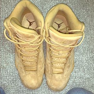 Nike Air Jordan Retro 13 “Wheat” sneakers.